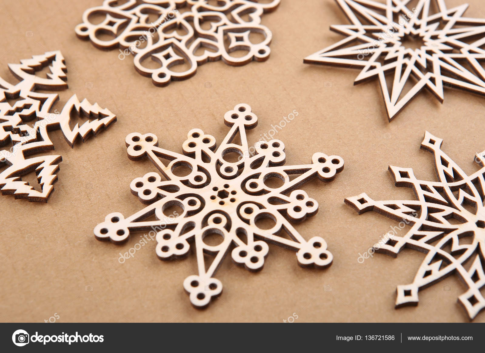 Laser cut wood snowflakes ornaments. Stock Photo by ©Vaitekune 136721586